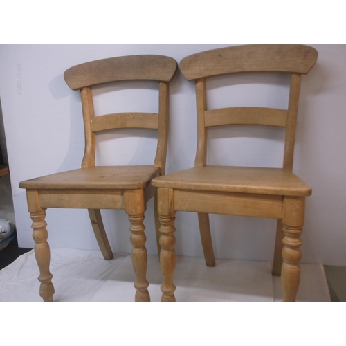 417 - A pair of pine kitchen chairs