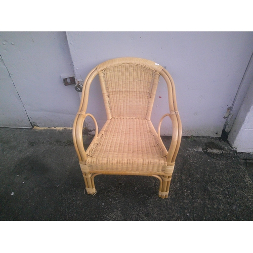 74 - A wicker armchair