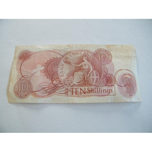 202 - A ten-shilling note – signed J. S. Forrd