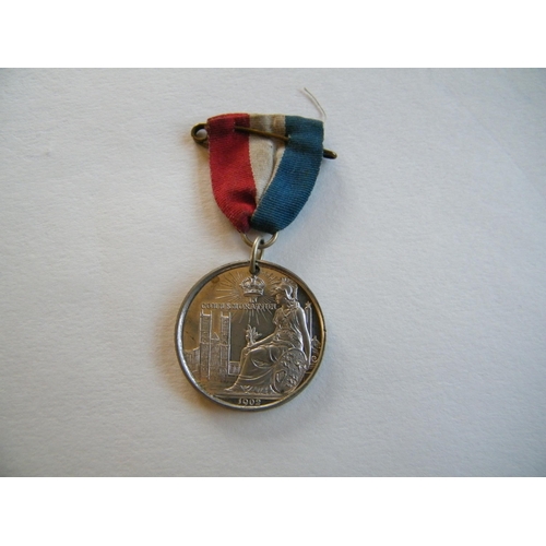 203 - A 1902 Coronation medal and ribbon