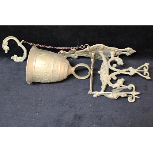 137 - A brass wall bell - 32cm