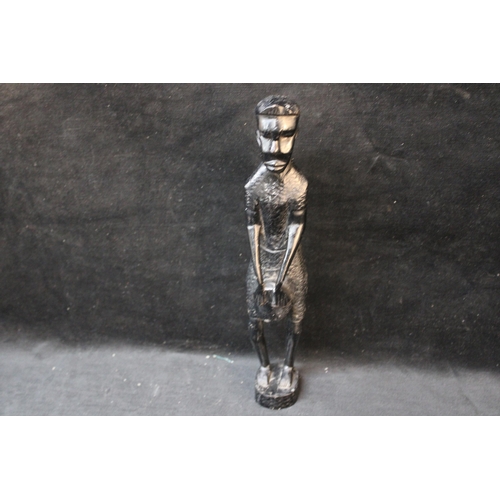 139 - A tall African figurine - 37cmH