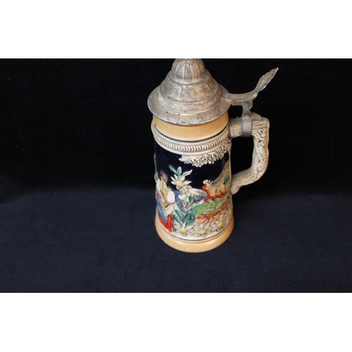 142 - A pottery beer stein - 22.5cmH