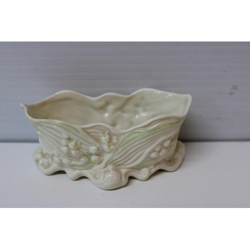 407 - A Belleek pot 14.5cmW X 6.5cmH gold mark