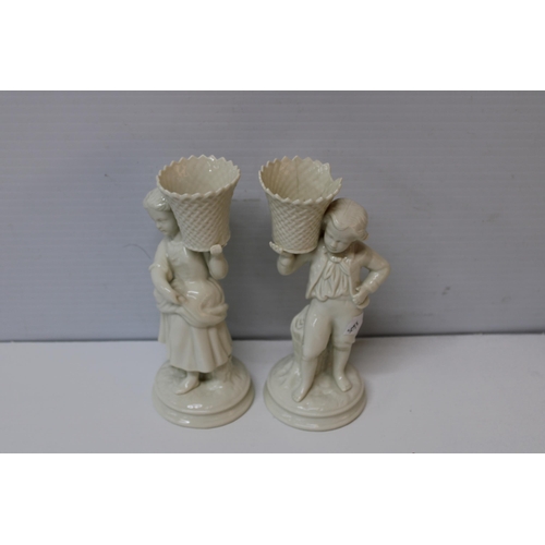 411 - Belleek boy & girl basket carriers each 23cmh blue mark boy damaged