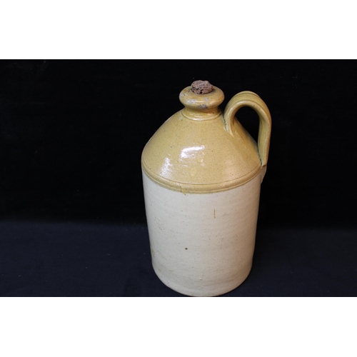 180 - A stoneware flagon - 35cmH