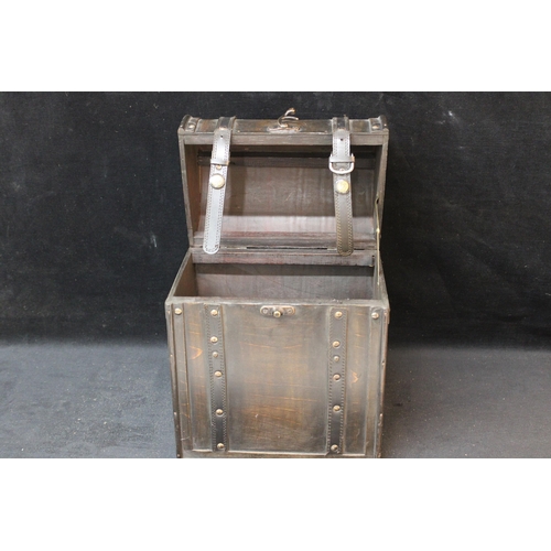 232 - A wooden wine carrier - 35cmH x 27cmW