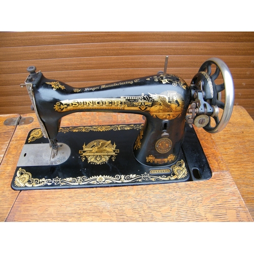 102 - A Singer treadle sewing machine - Model no. 15K - 1929 - 78cm x 86cm x 41cm