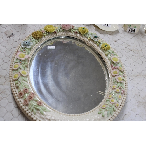 278 - A Belleek 6th period mirror, profusely decorated with flowers - 41cm x 34cm