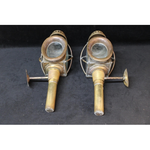 227 - A pair of copper & brass trap lamps - 44cmH each