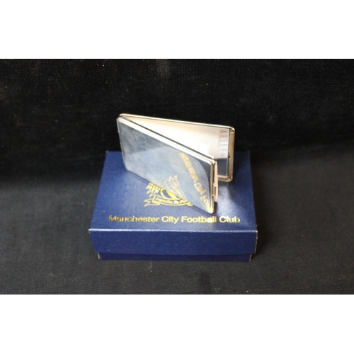 278 - A Manchester City Football Club silver plated address book - 10cmL