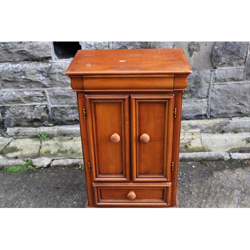 28 - A two door cabinet with drawer 83cmH
