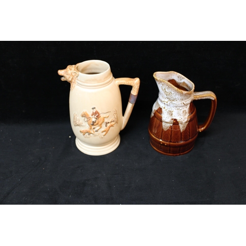 40 - Two pottery jugs tallest 20cmH