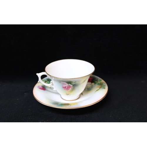 189 - A Royal Worcester cup and saucer