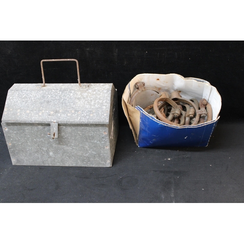 28 - A galvanised tool box & a box of iron rings each 13cmD