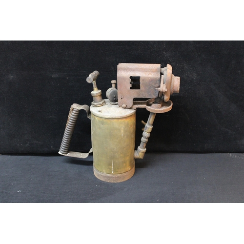 14 - A large Victorian brass blow lamp 38cmH X 37cmW