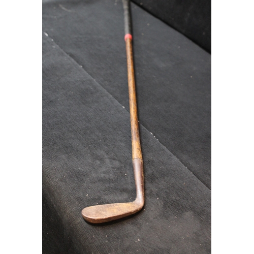 25 - A vintage hickory shafted golf club the Jigger 97cm