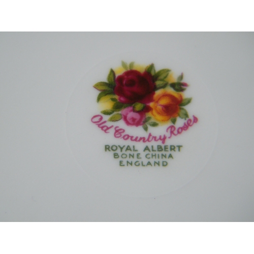 310 - Seven pieces of Royal Albert 'Old Country Roses'
