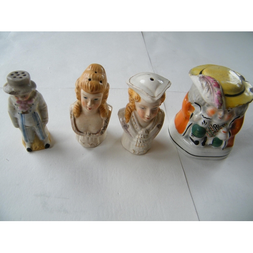320 - Four Staffordshire cruet figurines - 8.5cm tallest