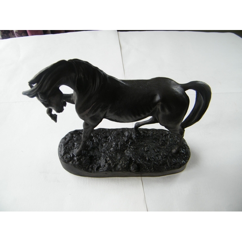 321 - A bronze figurine of a horse - 18cmH