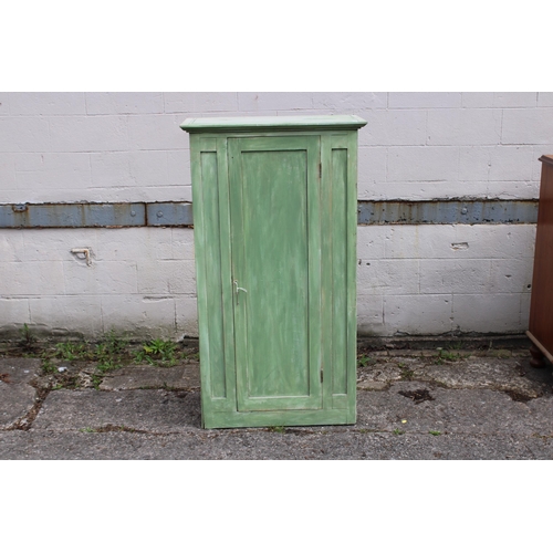 328 - A tall green one door cabinet