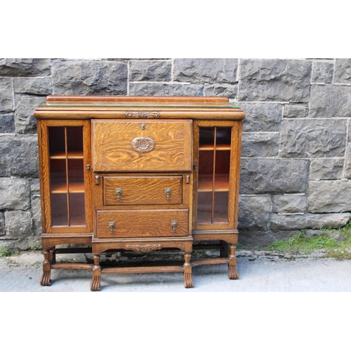 333 - An Edwardian oak writing cabinet - 123cmW x 112cmH