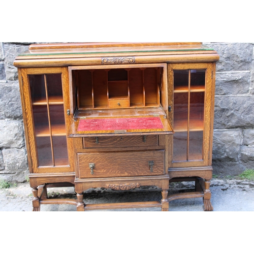 333 - An Edwardian oak writing cabinet - 123cmW x 112cmH