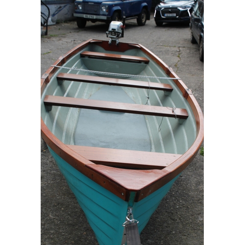 353 - A Morris 17ft fibre glass boat trimmed in mahogany with a 5hp four stroke outboard engine and traile... 