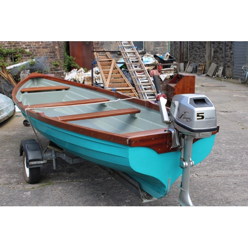 353 - A Morris 17ft fibre glass boat trimmed in mahogany with a 5hp four stroke outboard engine and traile... 