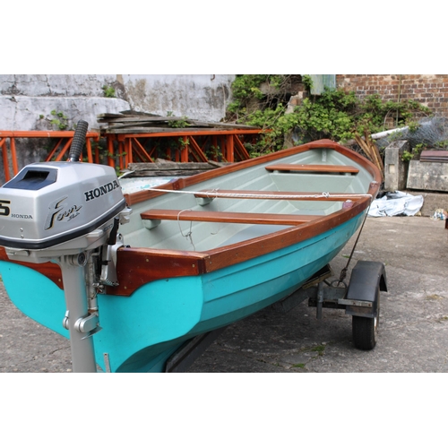 353 - A Morris 17ft fibre glass boat trimmed in mahogany with a 5hp four stroke outboard engine and traile... 