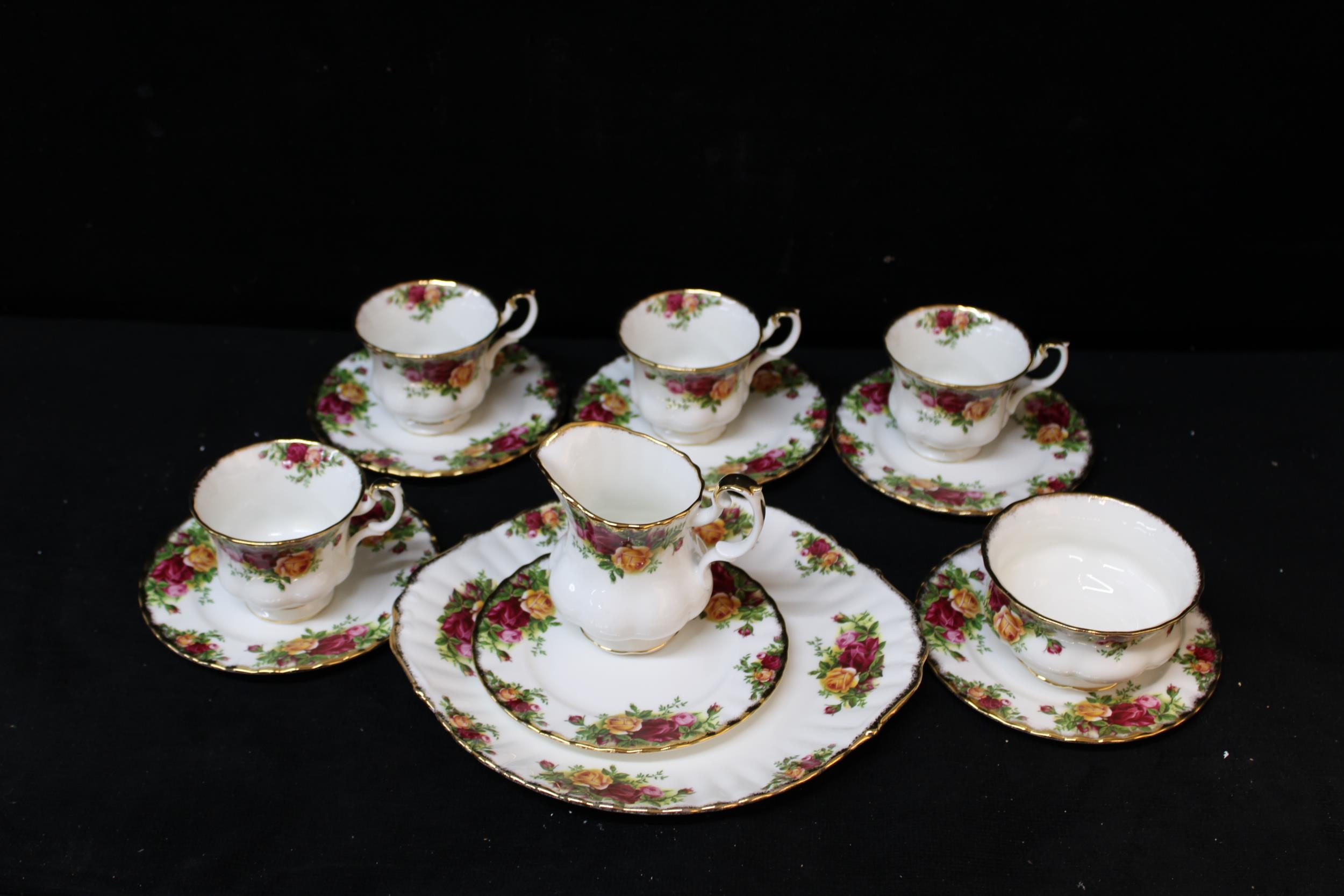 Thirteen pieces of Royal Albert 'Country Roses' pattern fine bone china