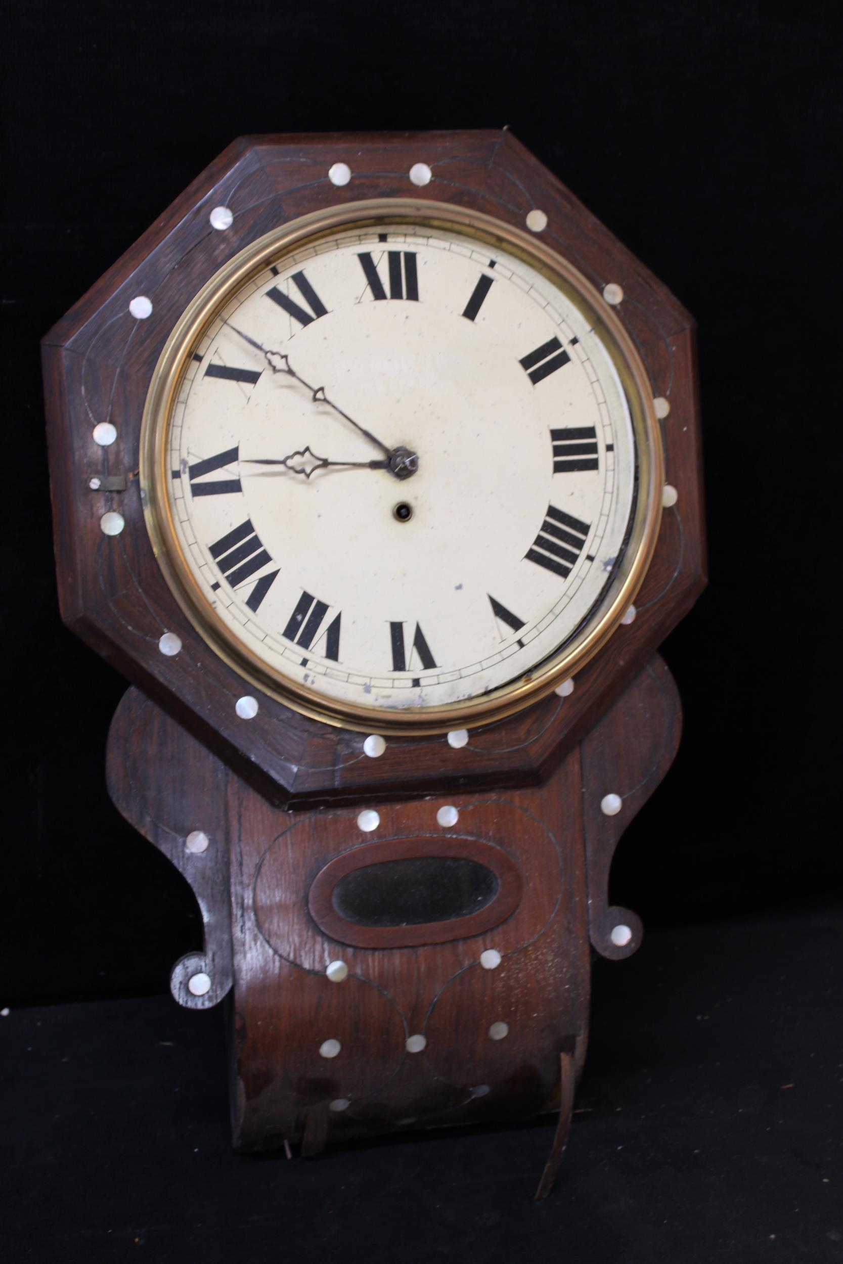 A Victorian wall clock inlaid with mother o pearl 70cmH