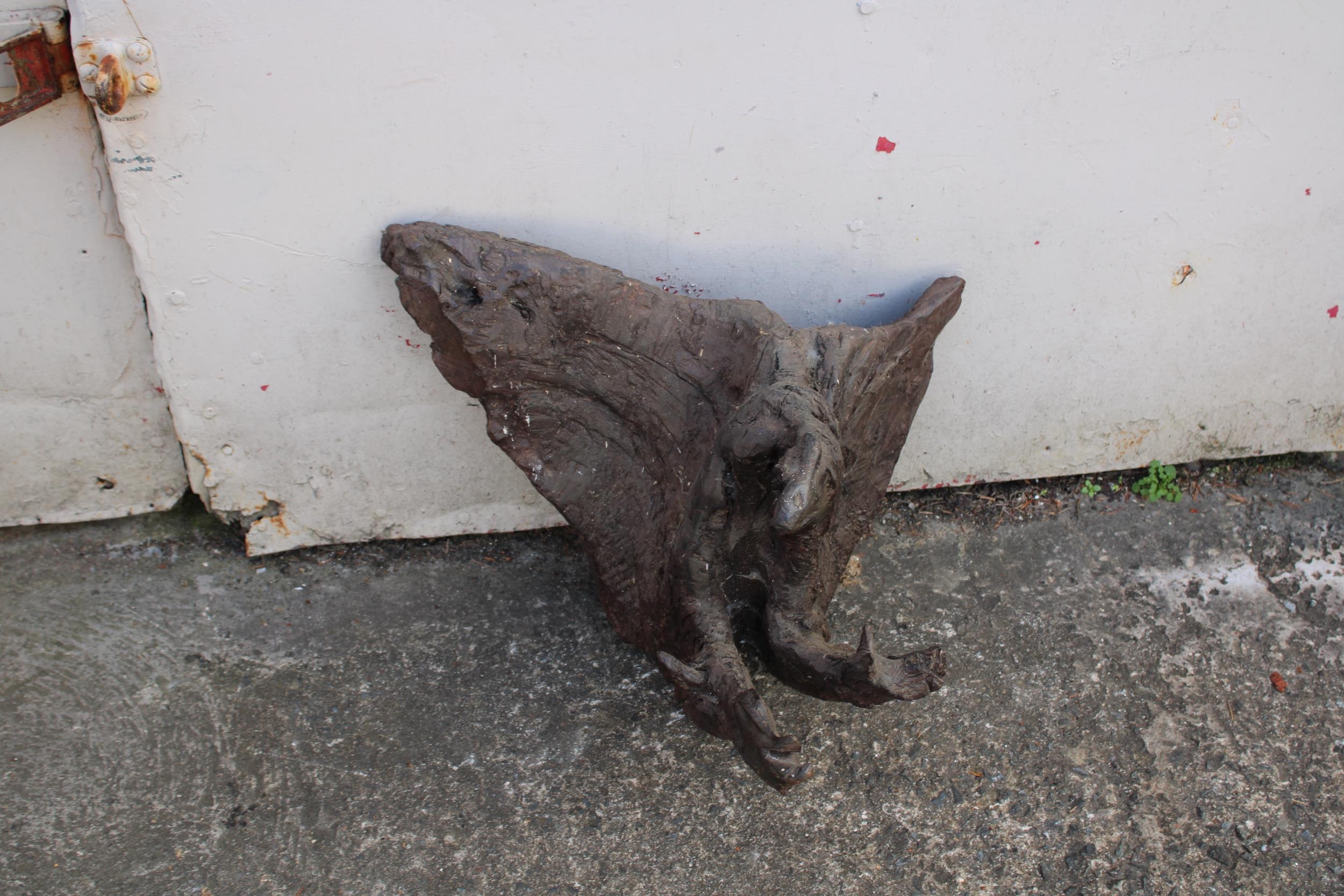 An original bog oak sculpture in the form of an Eagle 40cmH X 52cmW