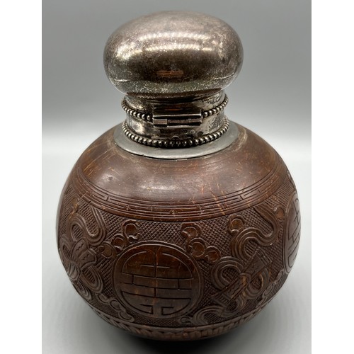 22 - Antique Japanese carved coconut sake bottle, fitted with a silver Dutch silver lid. c1920. [15cm hig... 