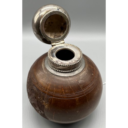 22 - Antique Japanese carved coconut sake bottle, fitted with a silver Dutch silver lid. c1920. [15cm hig... 