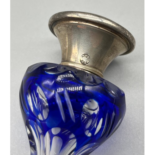 24 - Antique single blue overlay perfume bottle fitted with a 925 silver top. Has original stopper presen... 