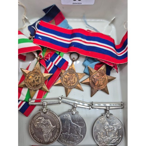 33 - A Selection of military WWII Medals; star medals, war medals and African Service medal