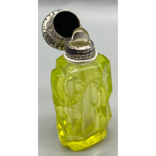 39 - 19th century silver mounted Uranium glass perfume bottle. C1865. [7.5cm high]