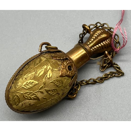 59 - Victorian Brass gilt Chatelaine perfume scent bottle in the form of an egg. [5.5cm high]