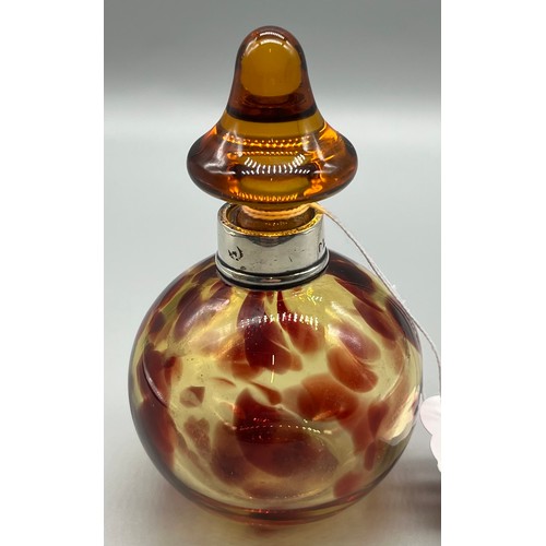 82 - Antique amber art glass perfume bottle fitted with a London silver collar. Comes with a Mushroom sha... 