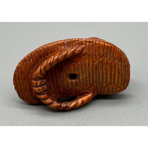 85 - Very Small Japanese hand carved netsuke; Toad sat upon a sandal. Fitted with black bead eyes. Unsign... 