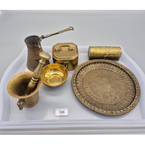 124 - Tray of Middle east collectables; Bronze/ brass pestle and mortar, Islamic brass and metal worked dr... 