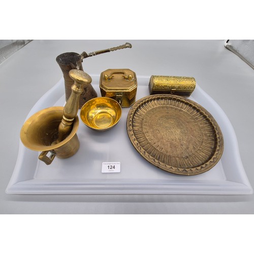 124 - Tray of Middle east collectables; Bronze/ brass pestle and mortar, Islamic brass and metal worked dr... 