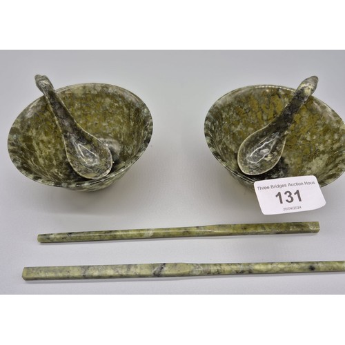 131 - Antique Chinese jade drinking cups, spoons a pair of chop sticks.