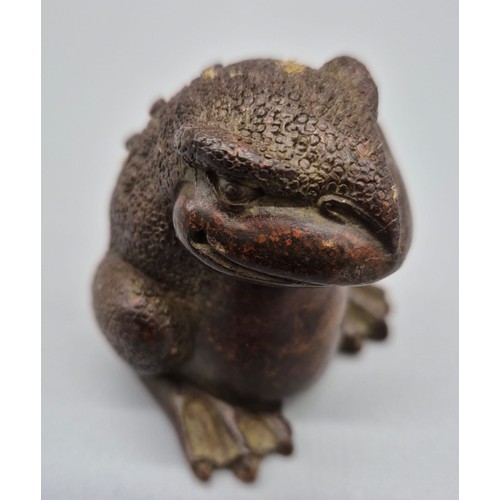 135 - Chinese bronze Fengshui Wealth three foot toad figure. Signed to the base [5cm high]