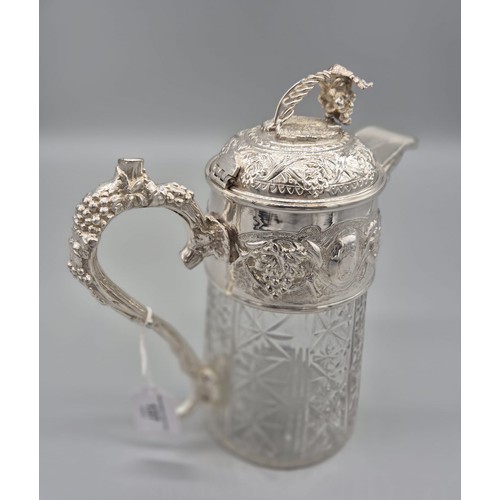 137 - Victorian Silver plate tankard Jug, Ornate grape and vine finial and raised relief design. Cut glass... 