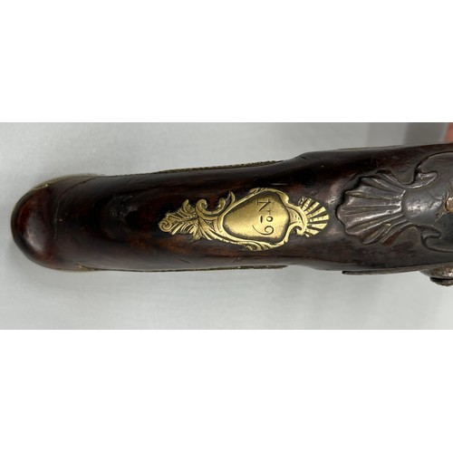 145 - A Pair of 18th/ 19th century Percussion Cap duelling pistols. Marked No.9 to each of the brass carto... 