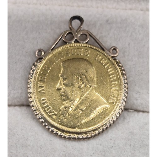 57 - 1897 South African 22ct yellow gold One Pond coin, fitted within a gold pendant. [9.34grams]