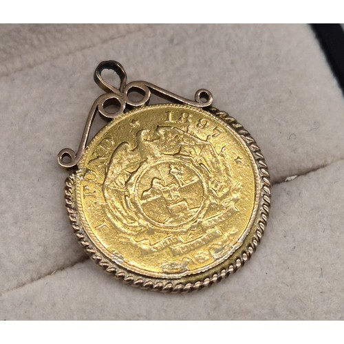 57 - 1897 South African 22ct yellow gold One Pond coin, fitted within a gold pendant. [9.34grams]