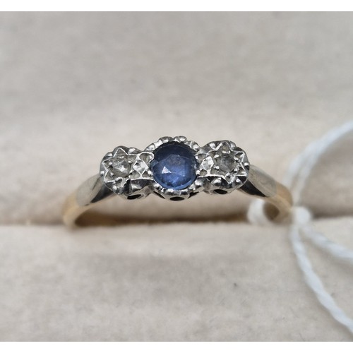 73 - Antique 9ct yellow gold and Platinum ladies ring, Fitted with a round cut blue topaz stone off set b... 